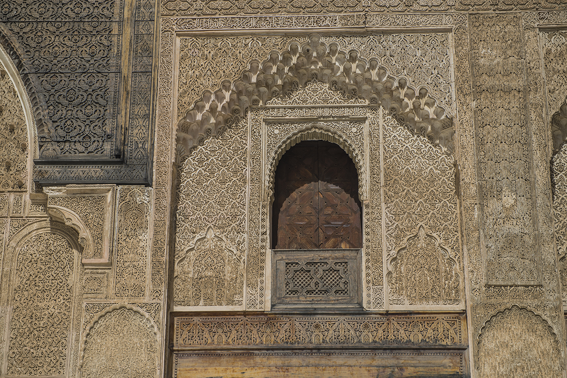 Window carving details in the courtyard of the Medersa Bou Inania