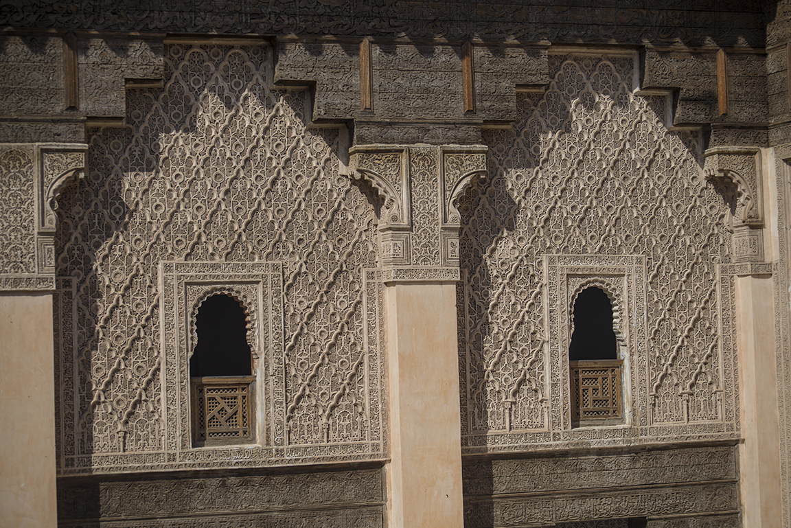 View of upper level windows in the courtyard the Ali ben Youssef Medersa