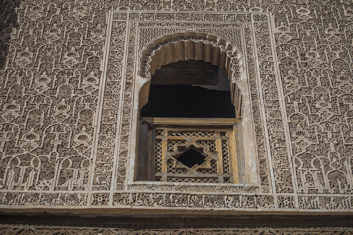 Upper level window carving details at the Ali ben Youssef Medersa