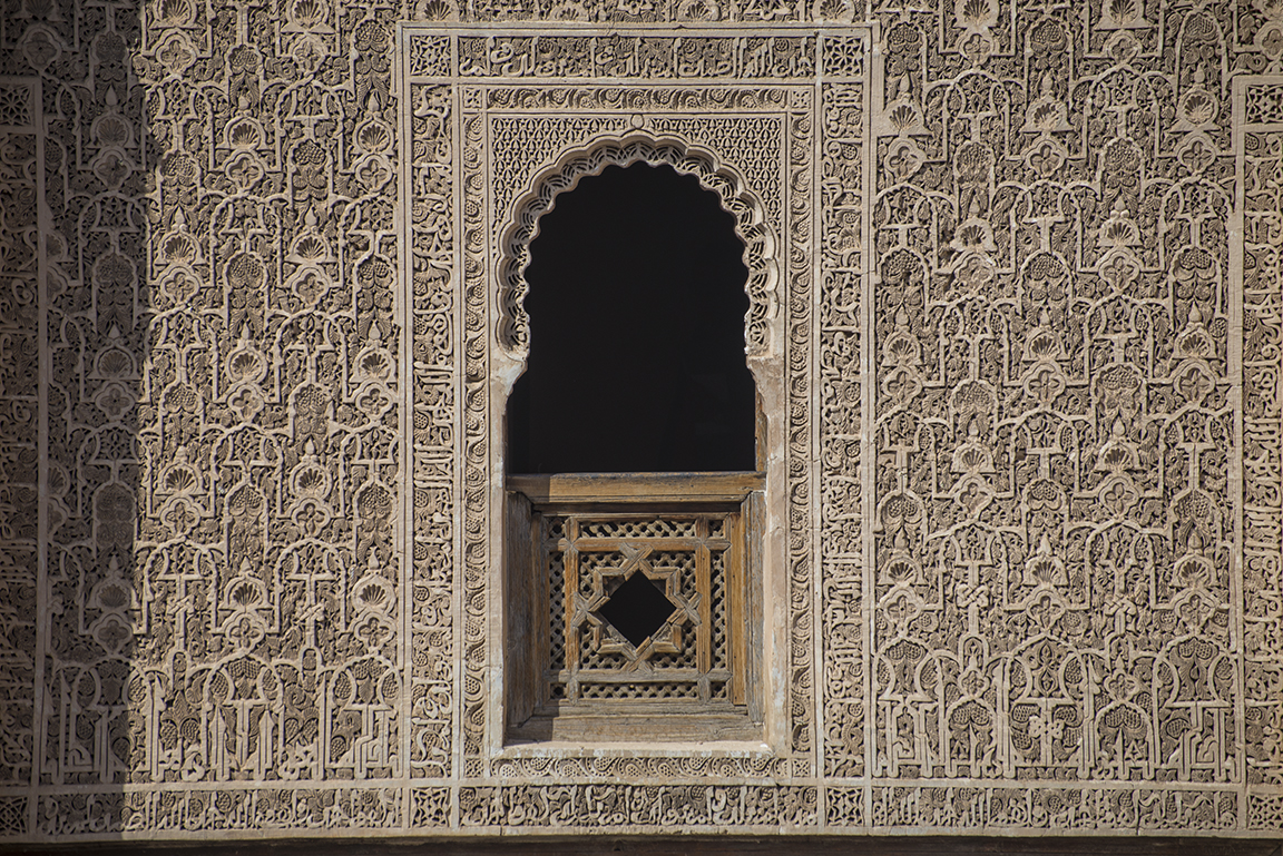 View of upper level window in the courtyard of the Ali ben Youssef Medersa