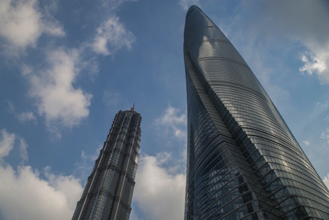 Jinmao Tower (left) and the Shanghai Tower (right)